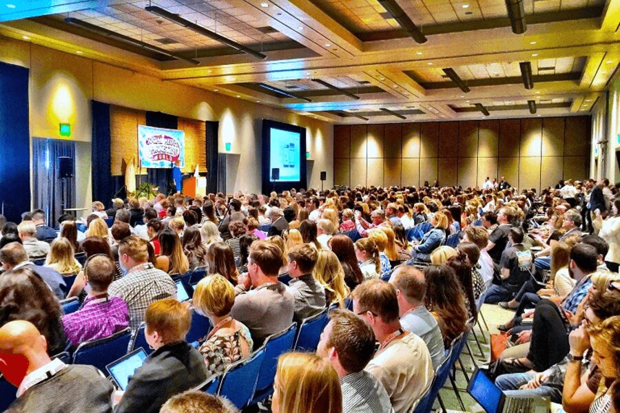 Large audience gathered for a professional event